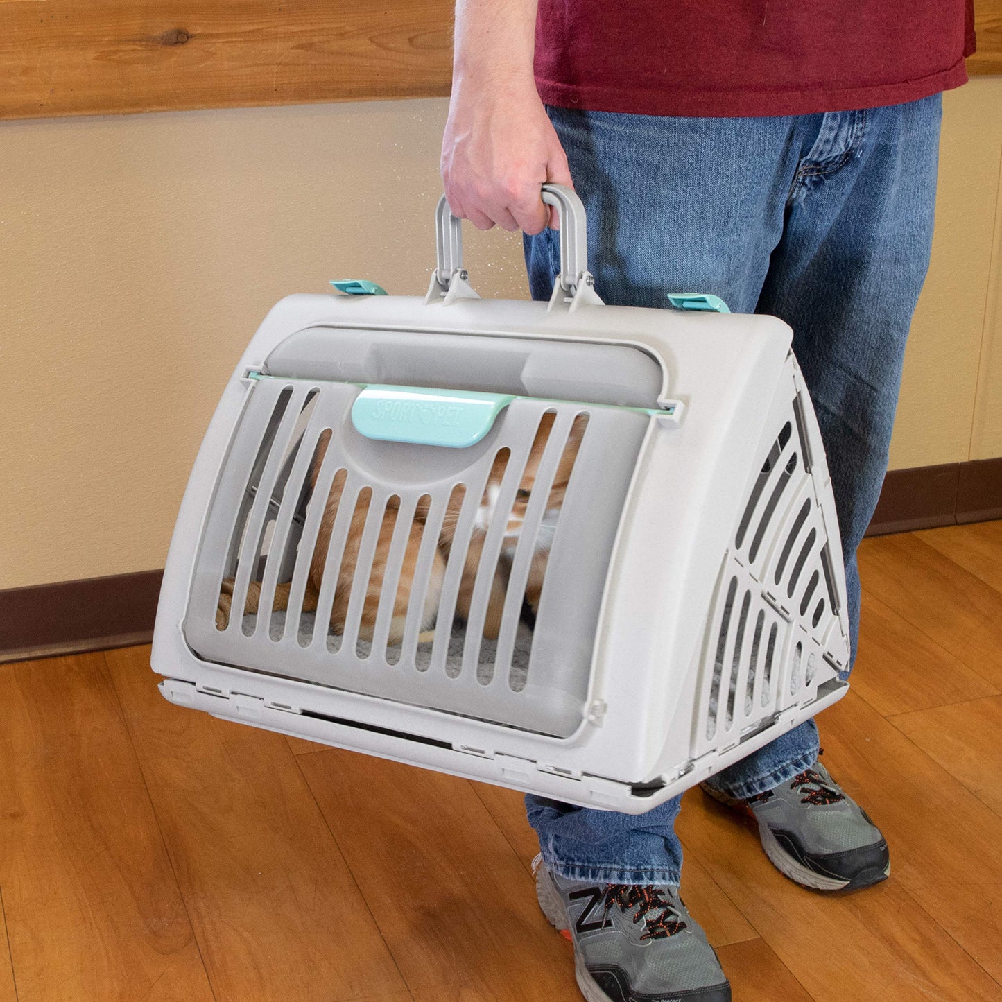 SportPet Designs Sport Pet Foldable Travel Cat Carrier with A Waterproof Bed.